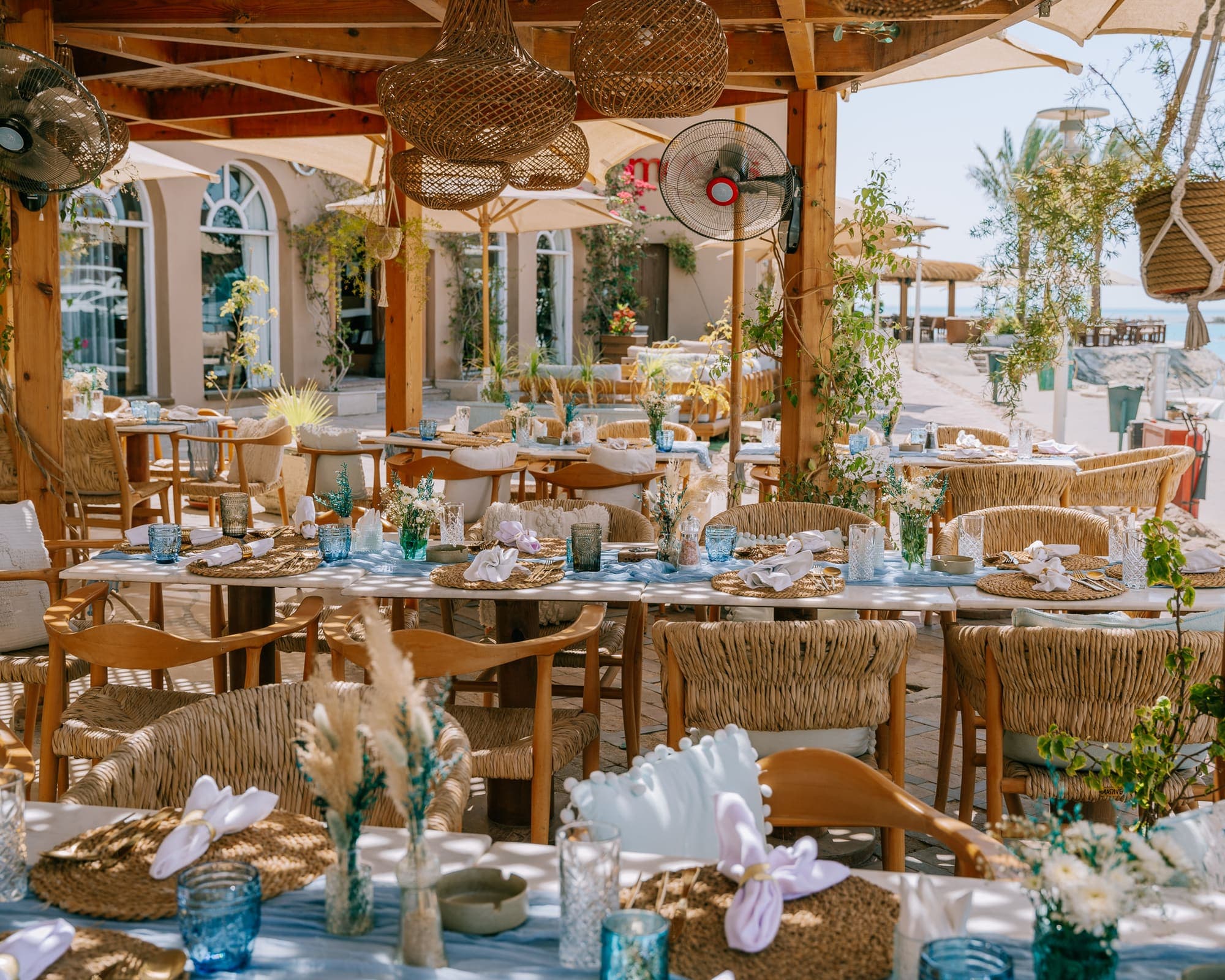 The wide terrace of Boho Café set for a long lunch