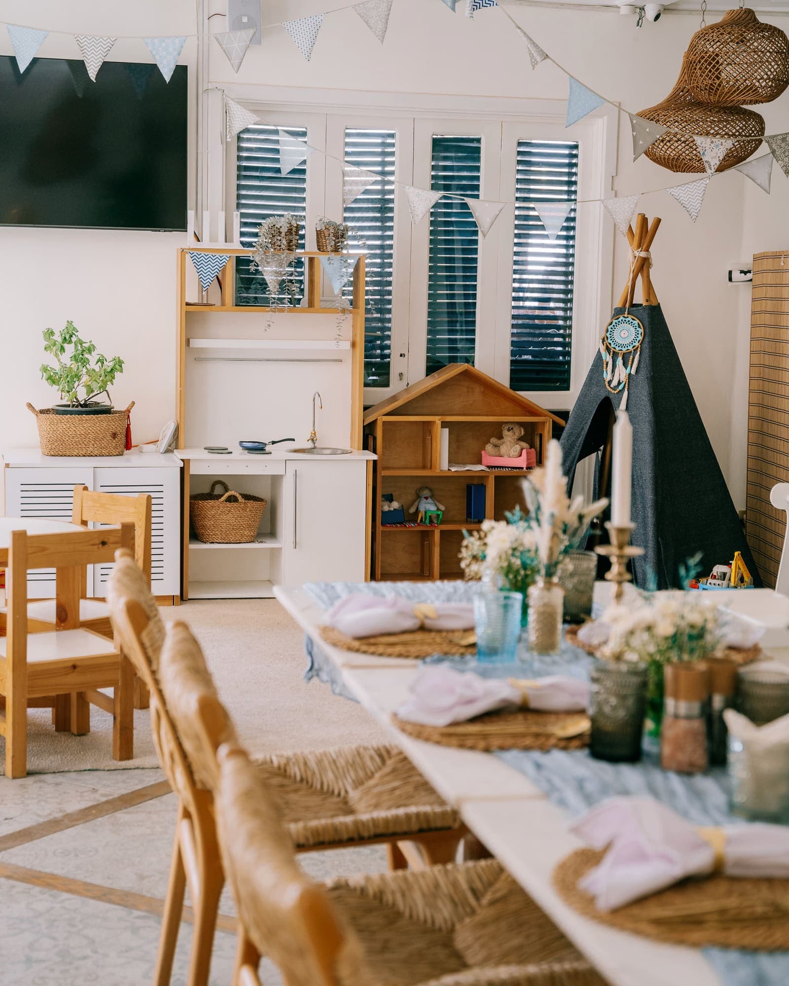 A long table set beside the kids corner